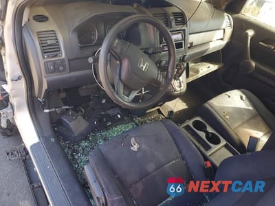 Zdjęcie 8 z 13 samochodu: 2010 HONDA CR-V LX VIN:5J6RE4H36AL000979 - miniatura