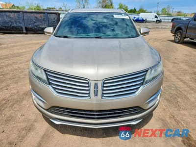 Piąte zdjęcie samochodu w środku: 2015 LINCOLN MKC VIN:5LMCJ2A94FUJ27718 - miniatura