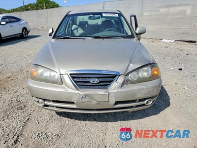 Piąte zdjęcie samochodu w środku: 2005 HYUNDAI ELANTRA GLS VIN:KMHDN46D35U962261 - miniatura