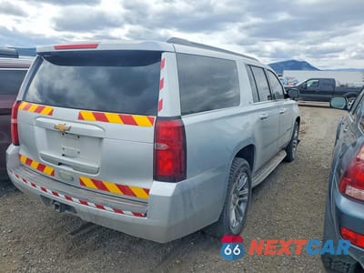 Trzecie zdjęcie samochodu z tyłu: 2018 CHEVROLET SUBURBAN K1500 LT VIN:1GNSKHKC8JR236330 - miniatura