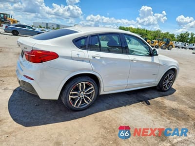 Trzecie zdjęcie samochodu z tyłu: 2016 BMW X4 XDRIVE28I VIN:5UXXW3C5XG0R21589 - miniatura