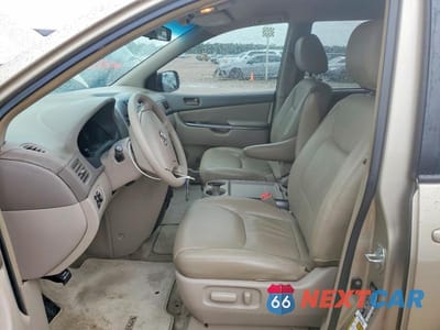 Zdjęcie 7 z 14 samochodu: 2010 TOYOTA SIENNA LE 7-PASSENGER VIN:5TDKK4CC2AS327689 - miniatura