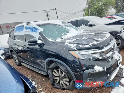 Czwarte zdjęcie samochodu z boku: 2019 HONDA PILOT EXL VIN:5FNYF6H5XKB054897 - miniatura