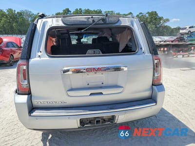 Zdjęcie 6 z 13 samochodu: 2017 GMC YUKON XL DENALI VIN:1GKS1HKJ2HR368203 - miniatura