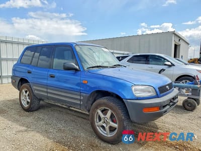 Czwarte zdjęcie samochodu z boku: 1997 TOYOTA RAV4 BASE VIN:JT3HP10V2V7031642 - miniatura