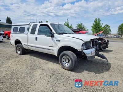 Czwarte zdjęcie samochodu z boku: 1999 FORD F250 SUPER DUTY VIN:1FTNX21F9XED23489 - miniatura