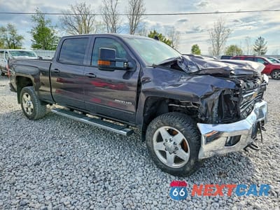 Czwarte zdjęcie samochodu z boku: 2015 CHEVROLET SILVERADO K2500 HEAVY DUTY LT VIN:1GC1KVE84FF587254 - miniatura