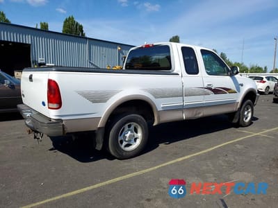 Trzecie zdjęcie samochodu z tyłu: 1997 FORD F150 VIN:1FTDX18W6VKD21340 - miniatura