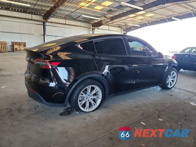 Trzecie zdjęcie samochodu z tyłu: 2022 TESLA MODEL Y VIN:7SAYGAEE4NF428318 - miniatura