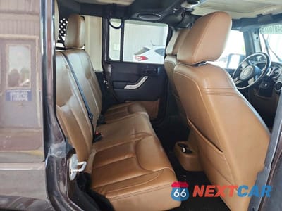 Zdjęcie 11 z 13 samochodu: 2013 JEEP WRANGLER UNLIMITED SAHARA VIN:1C4BJWEGXDL687930 - miniatura