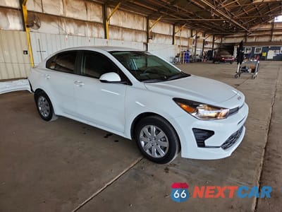 Czwarte zdjęcie samochodu z boku: 2023 KIA RIO LX VIN:3KPA24AD6PE553342 - miniatura