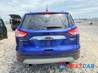 Zdjęcie 6 z 12 samochodu: 2014 FORD ESCAPE TITANIUM VIN:1FMCU9J92EUC86481 - miniatura