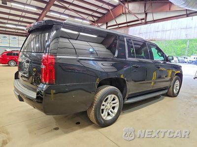 Trzecie zdjęcie samochodu z tyłu: 2019 CHEVROLET SUBURBAN K1500 LS VIN:1GNSKGKC7KR312602 - miniatura