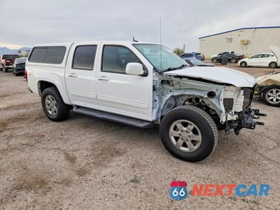 Czwarte zdjęcie samochodu z boku: 2011 GMC CANYON SLT VIN:1GTH6NFP5B8127706 - miniatura