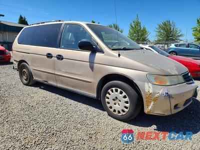 Czwarte zdjęcie samochodu z boku: 2002 HONDA ODYSSEY LX VIN:2HKRL18502H508110 - miniatura