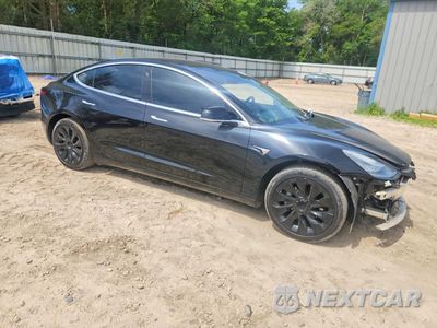 Czwarte zdjęcie samochodu z boku: 2019 TESLA MODEL 3 VIN:5YJ3E1EAXKF307198 - miniatura