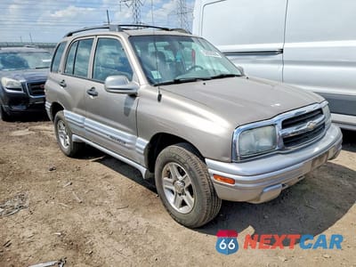 Czwarte zdjęcie samochodu z boku: 2002 CHEVROLET TRACKER LT VIN:2CNBJ634426925409 - miniatura