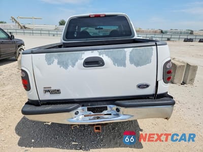 Zdjęcie 6 z 12 samochodu: 2001 FORD F150 SUPERCREW VIN:1FTRW08W91KD95882 - miniatura