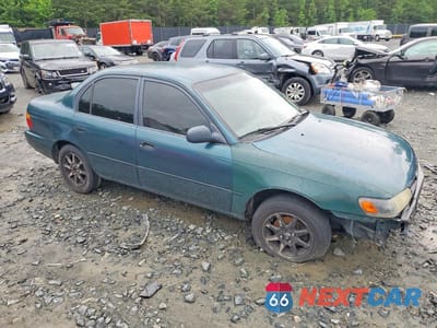 Czwarte zdjęcie samochodu z boku: 1994 TOYOTA COROLLA DX VIN:2T1AE09B1RC068580 - miniatura