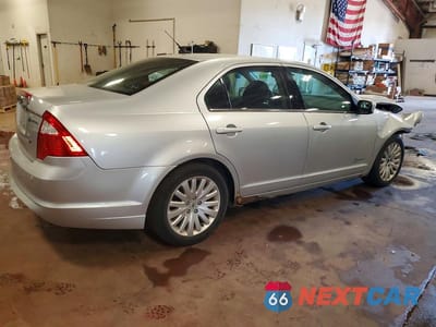 Trzecie zdjęcie samochodu z tyłu: 2012 FORD FUSION HYBRID VIN:3FADP0L34CR351054 - miniatura