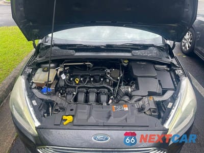 Zdjęcie 7 z 10 samochodu: 2015 FORD FOCUS TITANIUM VIN:1FADP3J23FL312020 - miniatura