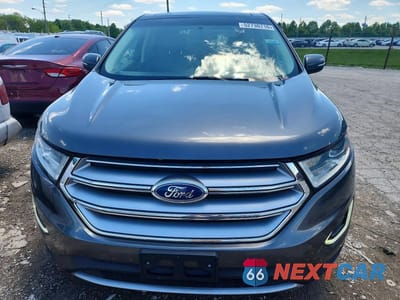Piąte zdjęcie samochodu w środku: 2018 FORD EDGE TITANIUM VIN:2FMPK4K95JBB43324 - miniatura