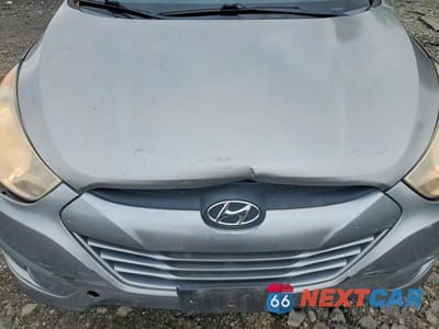 Zdjęcie 12 z 13 samochodu: 2011 HYUNDAI TUCSON GLS VIN:KM8JU3ACXBU276793 - miniatura