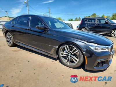 Czwarte zdjęcie samochodu z boku: 2018 BMW 750 XI VIN:WBA7F2C56JG424269 - miniatura