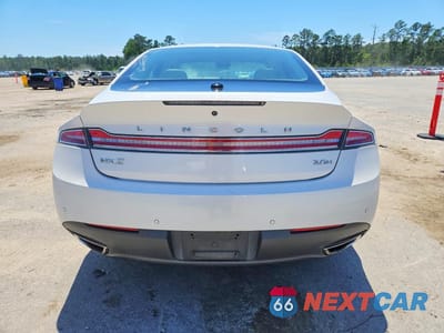 Zdjęcie 6 z 12 samochodu: 2016 LINCOLN MKZ HYBRID VIN:3LN6L2LU1GR627095 - miniatura