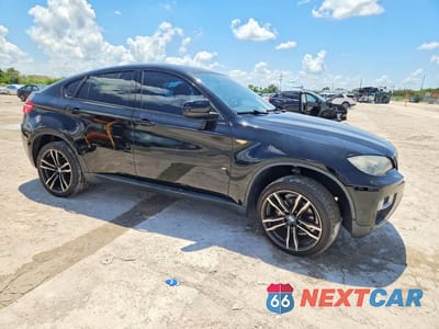 Czwarte zdjęcie samochodu z boku: 2014 BMW X6 XDRIVE35I VIN:5UXFG2C58E0K41657 - miniatura