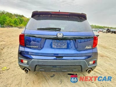 Zdjęcie 6 z 14 samochodu: 2022 HONDA PASSPORT ELITE VIN:5FNYF8H01NB032033 - miniatura