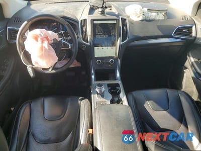 Zdjęcie 8 z 13 samochodu: 2022 FORD EDGE TITANIUM VIN:2FMPK4K94NBA39977 - miniatura