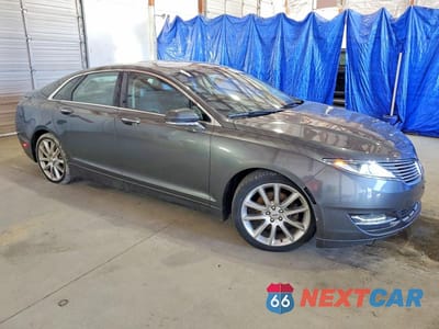 Czwarte zdjęcie samochodu z boku: 2016 LINCOLN MKZ VIN:3LN6L2G91GR618922 - miniatura