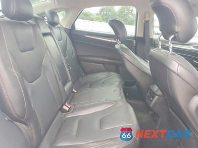 Zdjęcie 10 z 12 samochodu: 2014 FORD FUSION TITANIUM HEV VIN:3FA6P0RU9ER127502 - miniatura