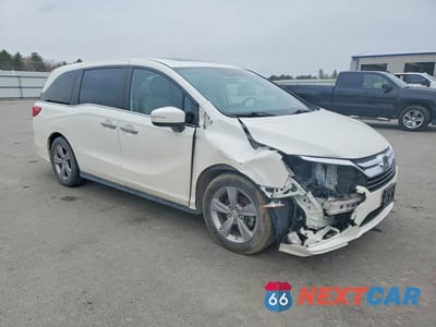 Czwarte zdjęcie samochodu z boku: 2018 HONDA ODYSSEY EXL VIN:5FNRL6H71JB055921 - miniatura