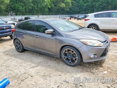 Czwarte zdjęcie samochodu z boku: 2012 FORD FOCUS SE VIN:1FAHP3K22CL335641 - miniatura