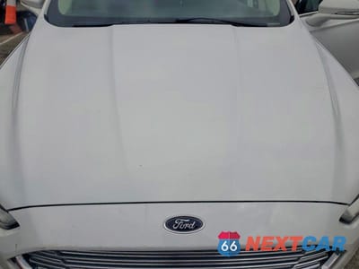 Zdjęcie 11 z 12 samochodu: 2014 FORD FUSION TITANIUM HEV VIN:3FA6P0RU9ER127502 - miniatura