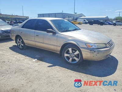 Czwarte zdjęcie samochodu z boku: 1999 TOYOTA CAMRY LE V6 VIN:JT2BF28K0X0170760 - miniatura