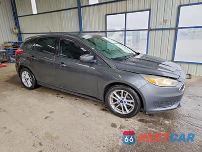 Czwarte zdjęcie samochodu z boku: 2018 FORD FOCUS SE VIN:1FADP3K25JL236291 - miniatura