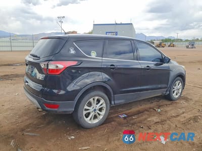 Trzecie zdjęcie samochodu z tyłu: 2017 FORD ESCAPE SE VIN:1FMCU9GD5HUB60664 - miniatura