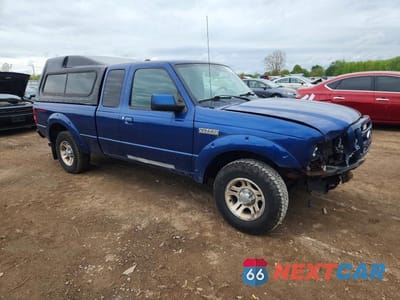 Czwarte zdjęcie samochodu z boku: 2011 FORD RANGER SUPER CAB VIN:1FTKR4EE5BPA53054 - miniatura