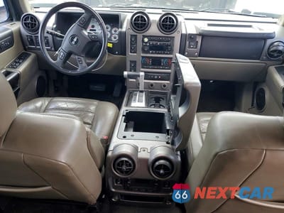 Zdjęcie 8 z 13 samochodu: 2004 HUMMER H2 VIN:5GRGN23U24H112847 - miniatura