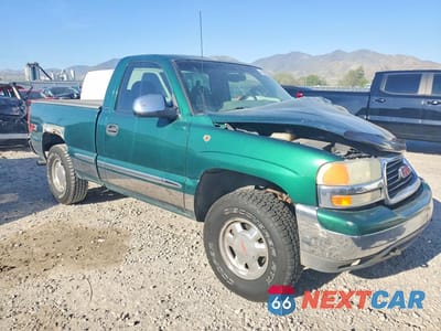 Czwarte zdjęcie samochodu z boku: 1999 GMC NEW SIERRA K1500 VIN:1GTEK14T4XZ517799 - miniatura