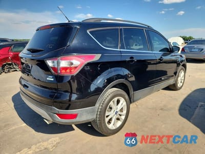 Trzecie zdjęcie samochodu z tyłu: 2017 FORD ESCAPE SE VIN:1FMCU0GD7HUA09644 - miniatura