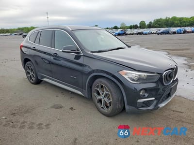 Czwarte zdjęcie samochodu z boku: 2018 BMW X1 XDRIVE28I VIN:WBXHT3C39J5K23453 - miniatura