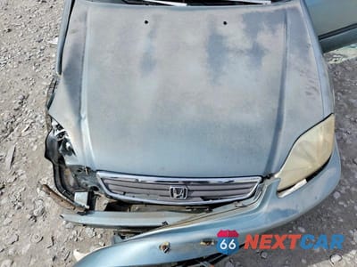 Zdjęcie 11 z 12 samochodu: 1999 HONDA CIVIC LX VIN:1HGEJ6678XL020579 - miniatura
