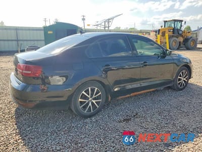 Trzecie zdjęcie samochodu z tyłu: 2016 VOLKSWAGEN JETTA SE VIN:3VWB67AJ9GM413904 - miniatura