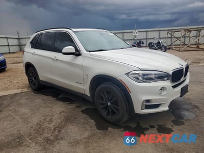 Czwarte zdjęcie samochodu z boku: 2014 BMW X5 SDRIVE35I VIN:5UXKR2C52E0H31314 - miniatura