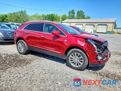 Czwarte zdjęcie samochodu z boku: 2019 CADILLAC XT5 LUXURY VIN:1GYKNCRS7KZ260937 - miniatura