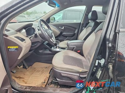 Zdjęcie 7 z 13 samochodu: 2013 HYUNDAI TUCSON GLS VIN:KM8JUCAC3DU680067 - miniatura